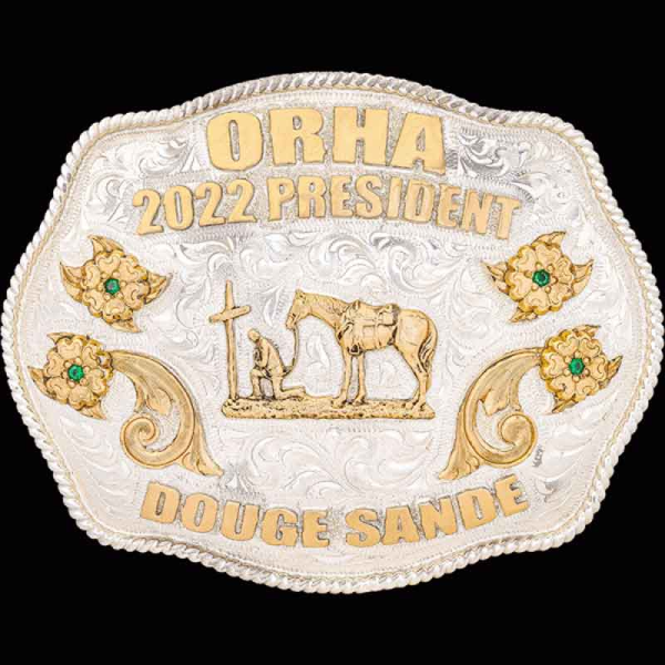 The Dallas Belt Buckle is a silver buckle with a hand engraved base and rope frame, bronze flowers and lettering. Personalize this shiny silver buckle design today!